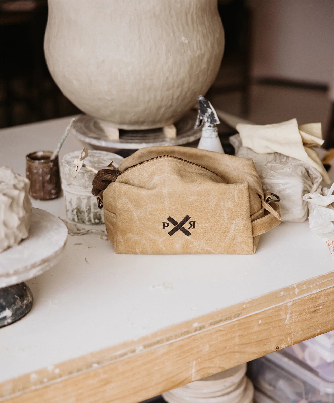 pony rider slow road duffle toiletry bag | clay