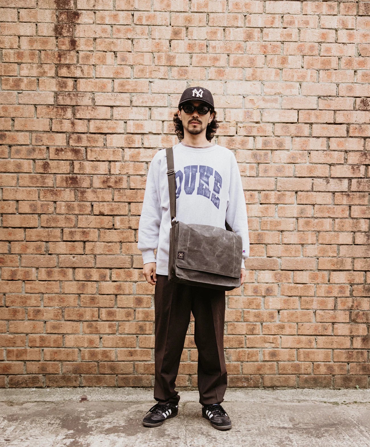 pony rider slow road laptop satchel | black
